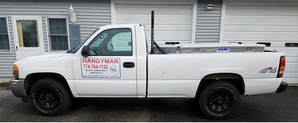 Picture of White Knight Handyman Service work truck.